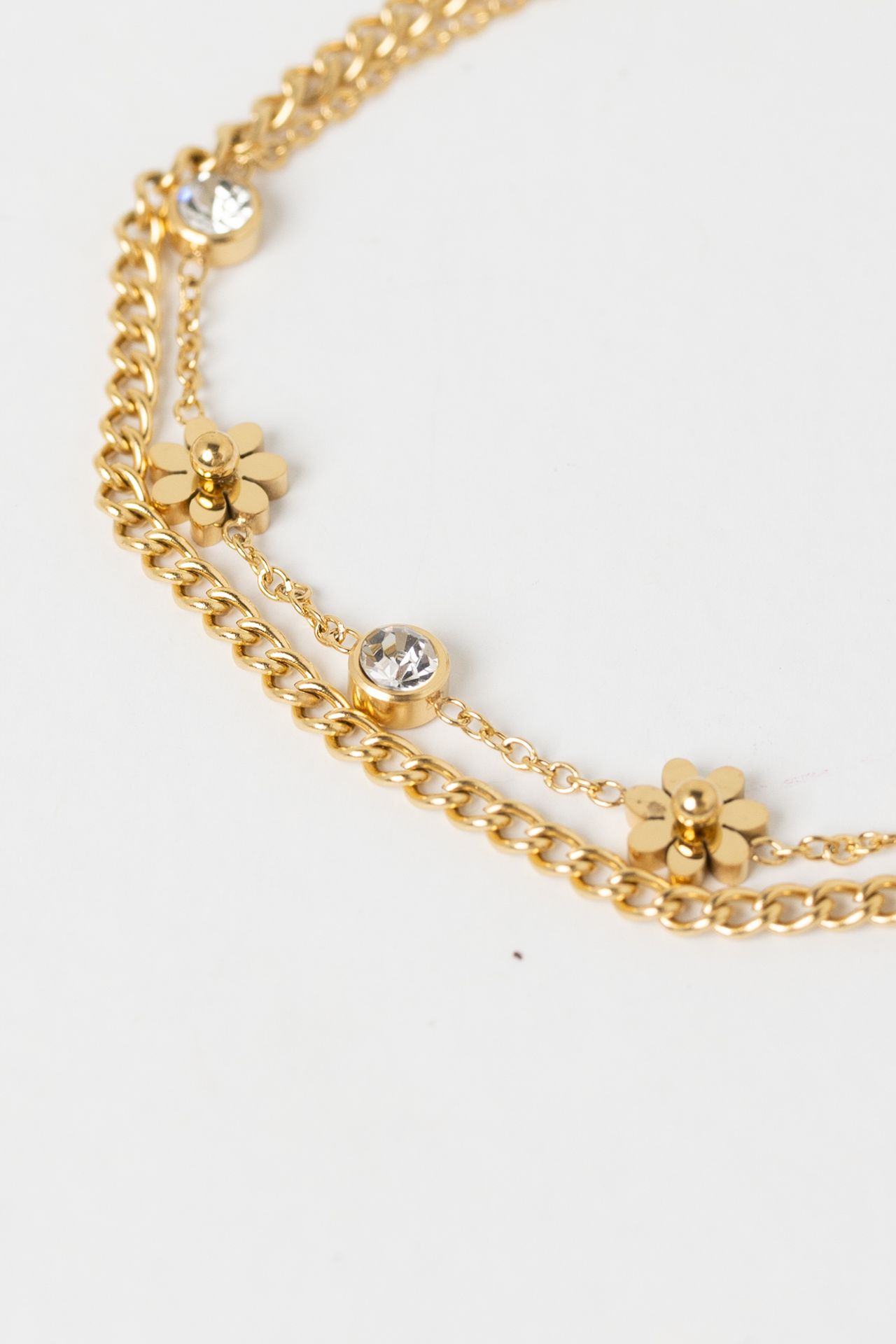 Norah Goudkleurige armband met steentjes en bloemen gold 216292-199