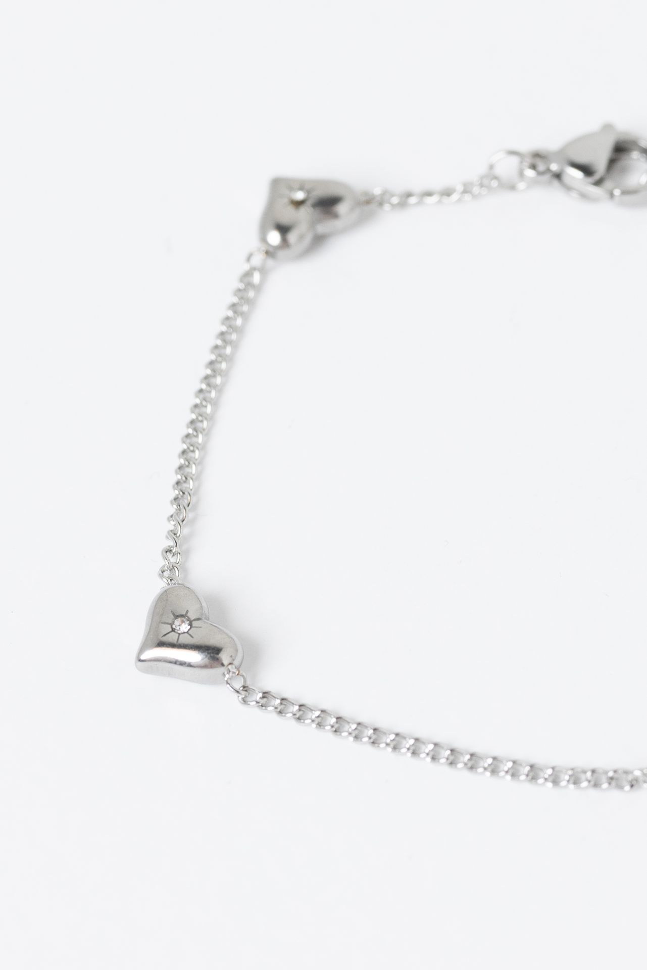 Norah Zilverkleurige armband met hartjes silver 217196-099