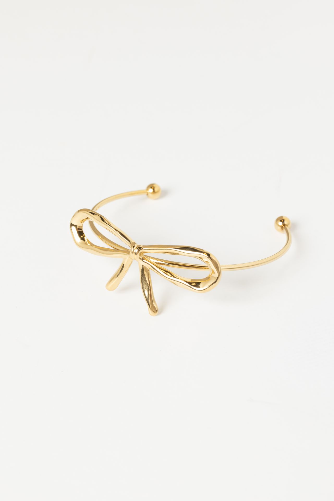 Norah Goudkleurige armband met strik gold 217694-199-ONE