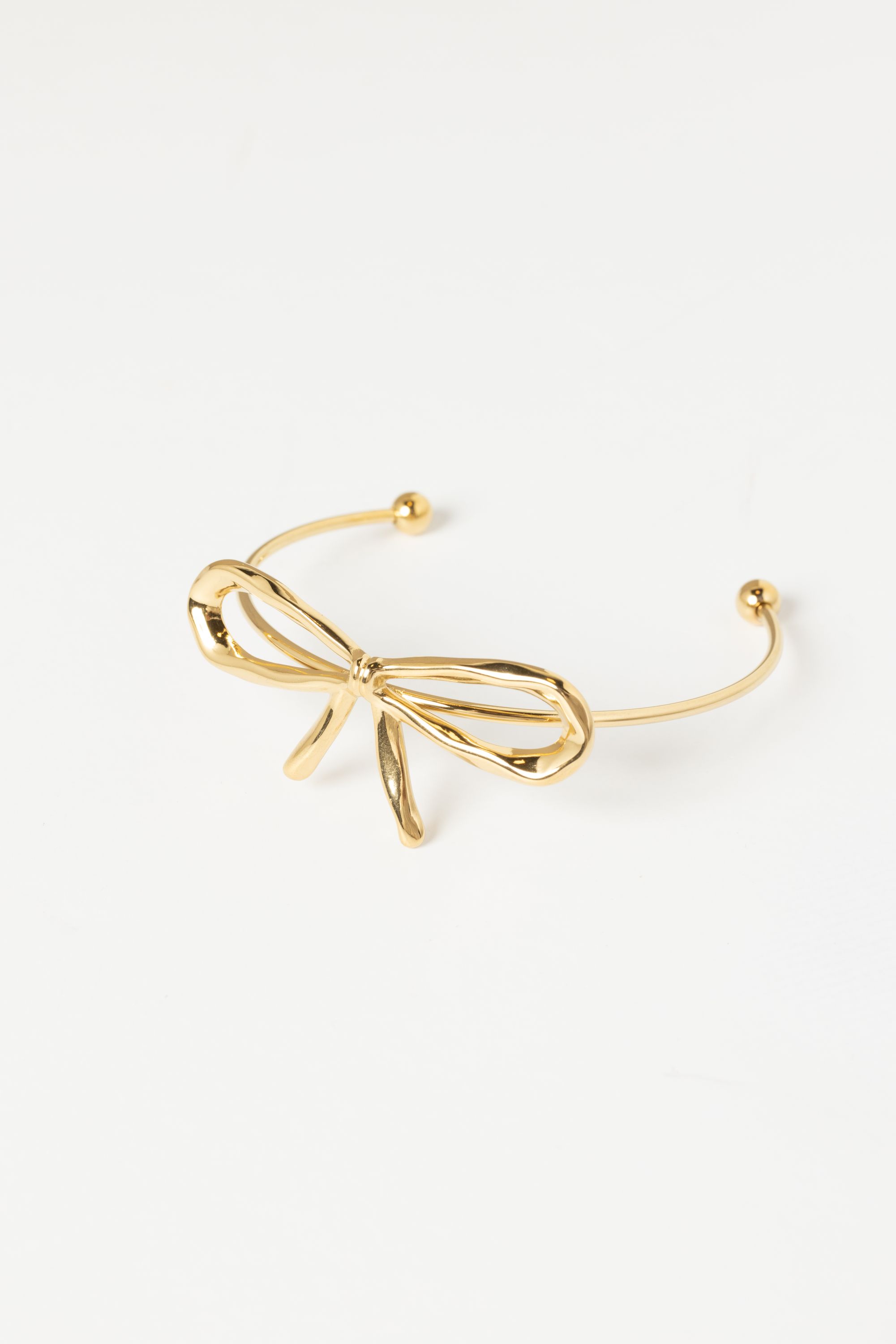 Goudkleurige armband met strik